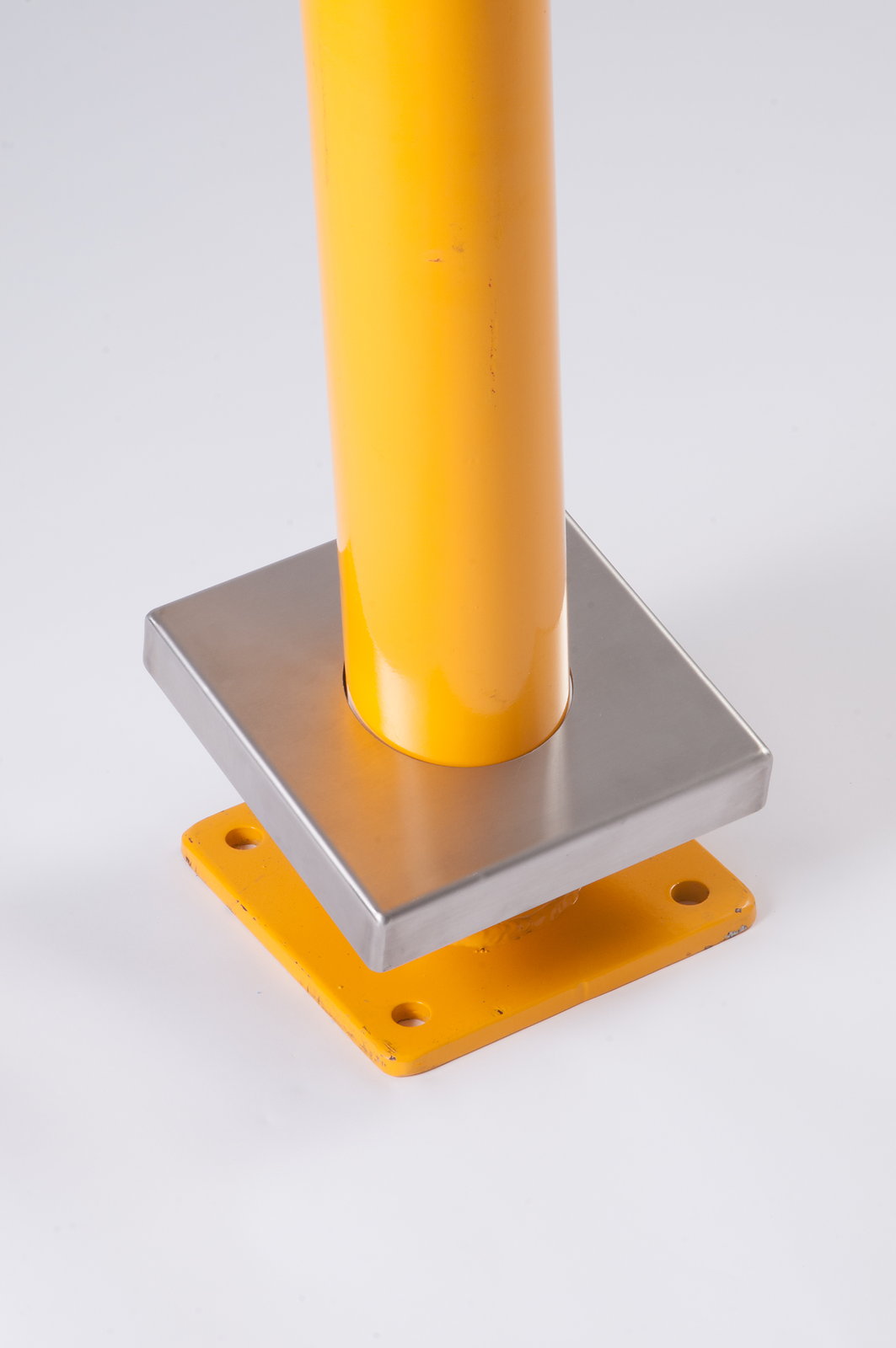 Stainless Steel Yellow powder-coated base plate cover concealing bolts on a bolt-down bollard - Park Supplier - view 2