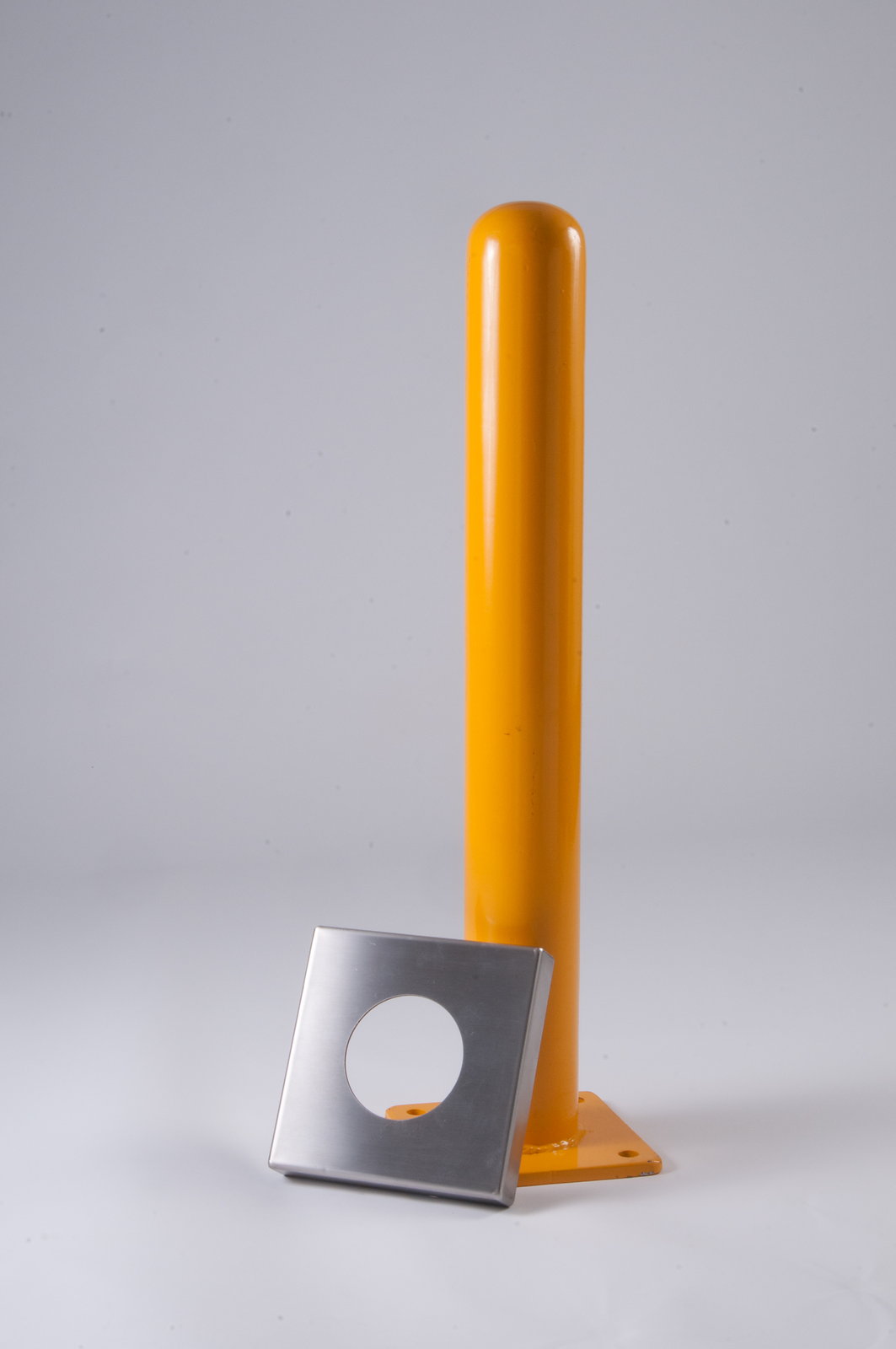Stainless Steel Yellow powder-coated base plate cover concealing bolts on a bolt-down bollard - Park Supplier - view 3